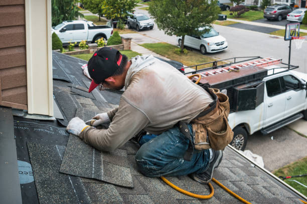 Professional Storm Damage Roof Repair technician working in Bonaire, GA